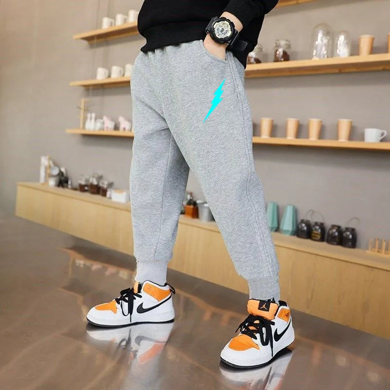 EnerGlow Kids’ Lightning Joggers – Soft Cotton Sports Trousers with Glow-In-The-Dark Print & Handy Side Pockets