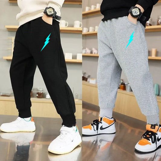 EnerGlow Kids’ Lightning Joggers – Soft Cotton Sports Trousers with Glow-In-The-Dark Print & Handy Side Pockets