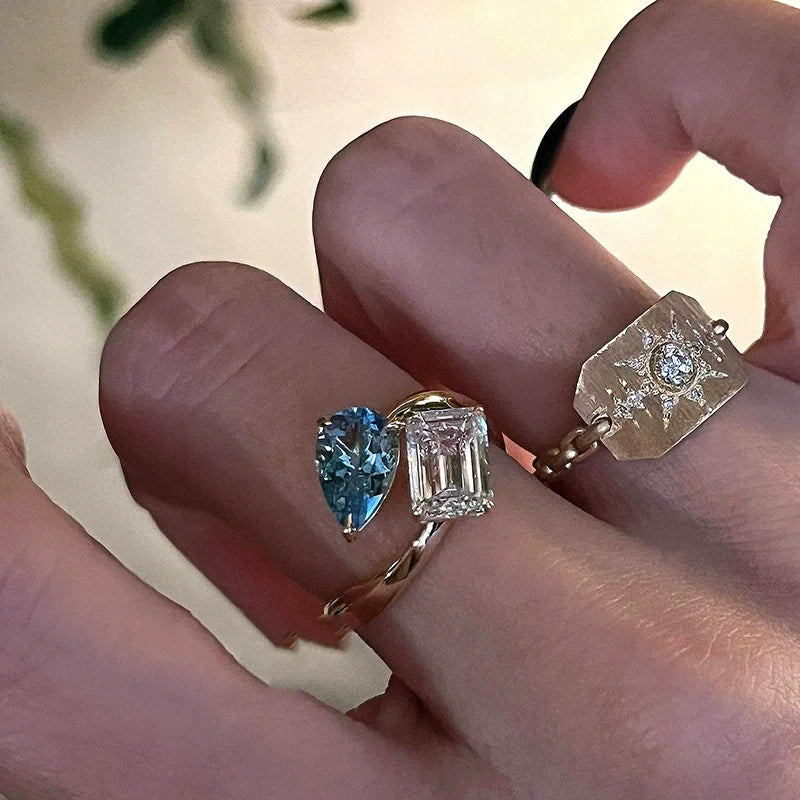 xiyanike Women's Adjustable Blue and Clear Zircon Two-Stone Ring, Geometric Open-Band Cocktail Jewelry